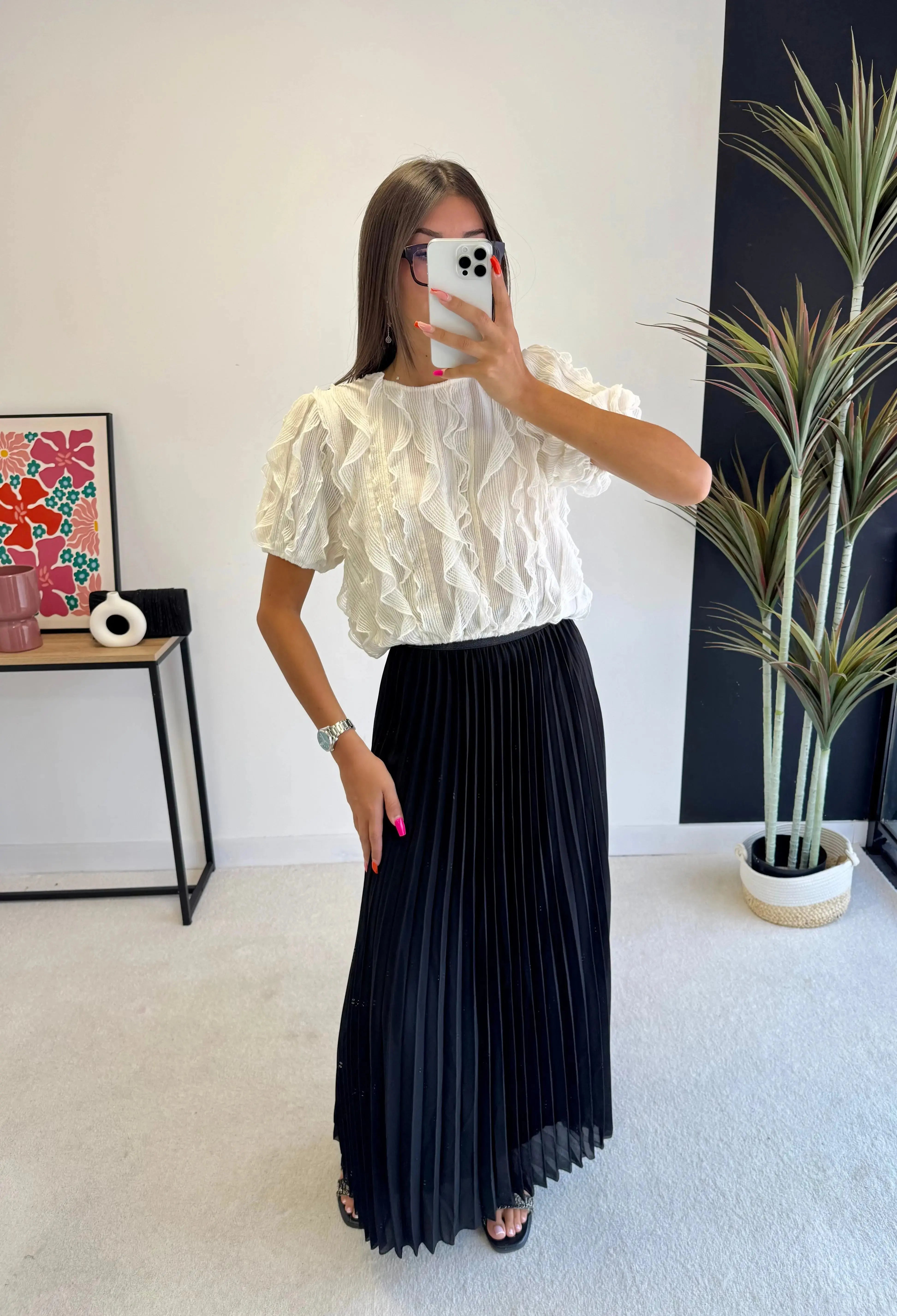 Jupes plissées noires