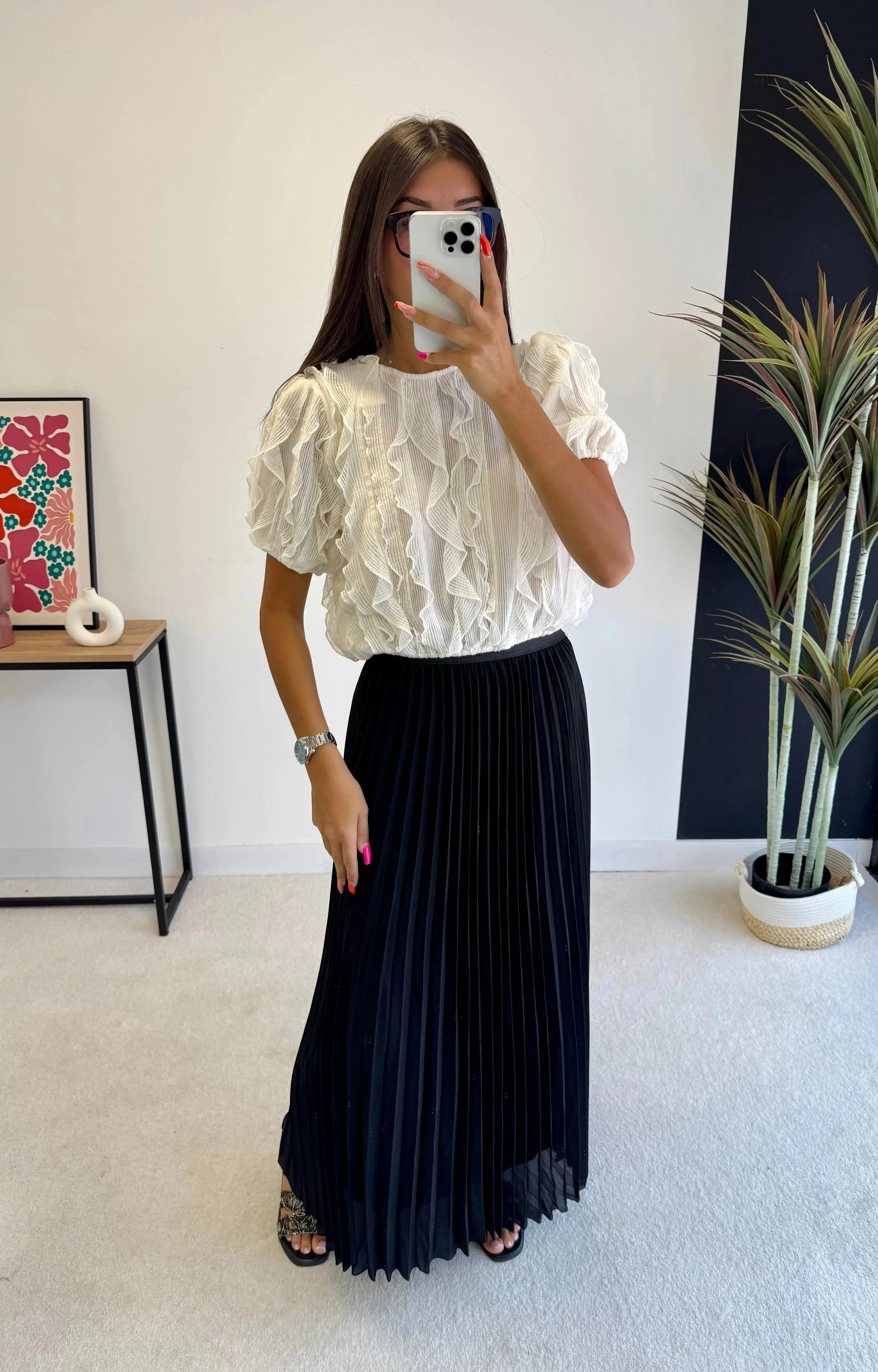 Jupes plissées noires